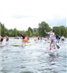 People Racing on Paddleboards