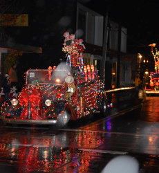 Cars Decorated in Christmas Lights on Parade